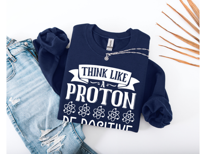 Think Like A Proton Be Positive Crewneck