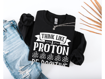Think Like A Proton Be Positive Crewneck