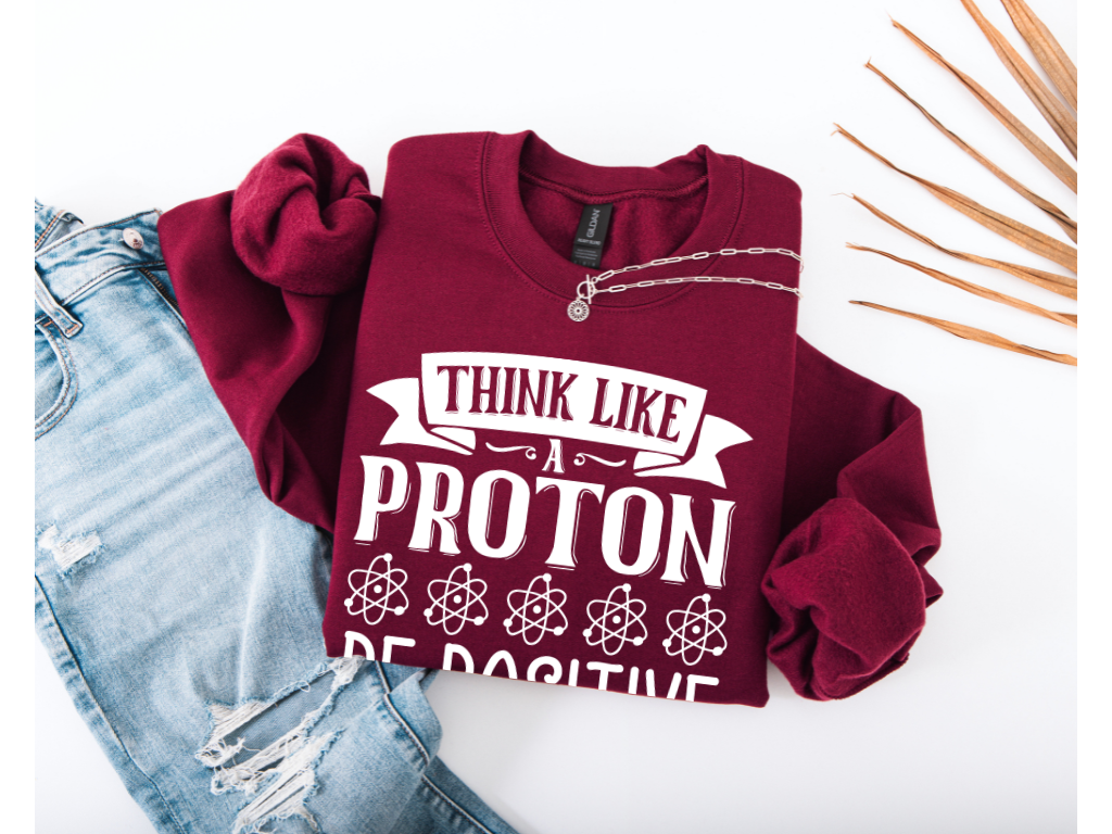 Think Like A Proton Be Positive Crewneck