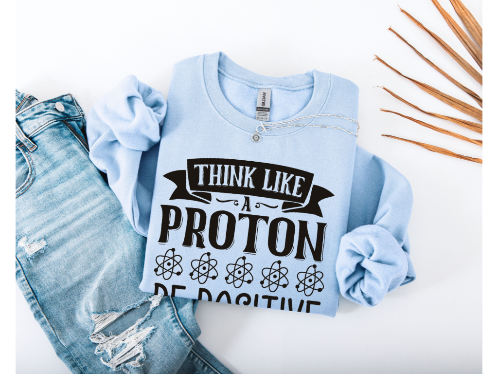 Think Like A Proton Be Positive Crewneck