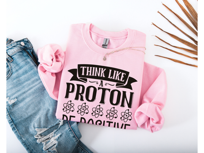 Think Like A Proton Be Positive Crewneck