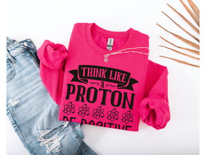 Think Like A Proton Be Positive Crewneck