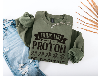 Think Like A Proton Be Positive Crewneck